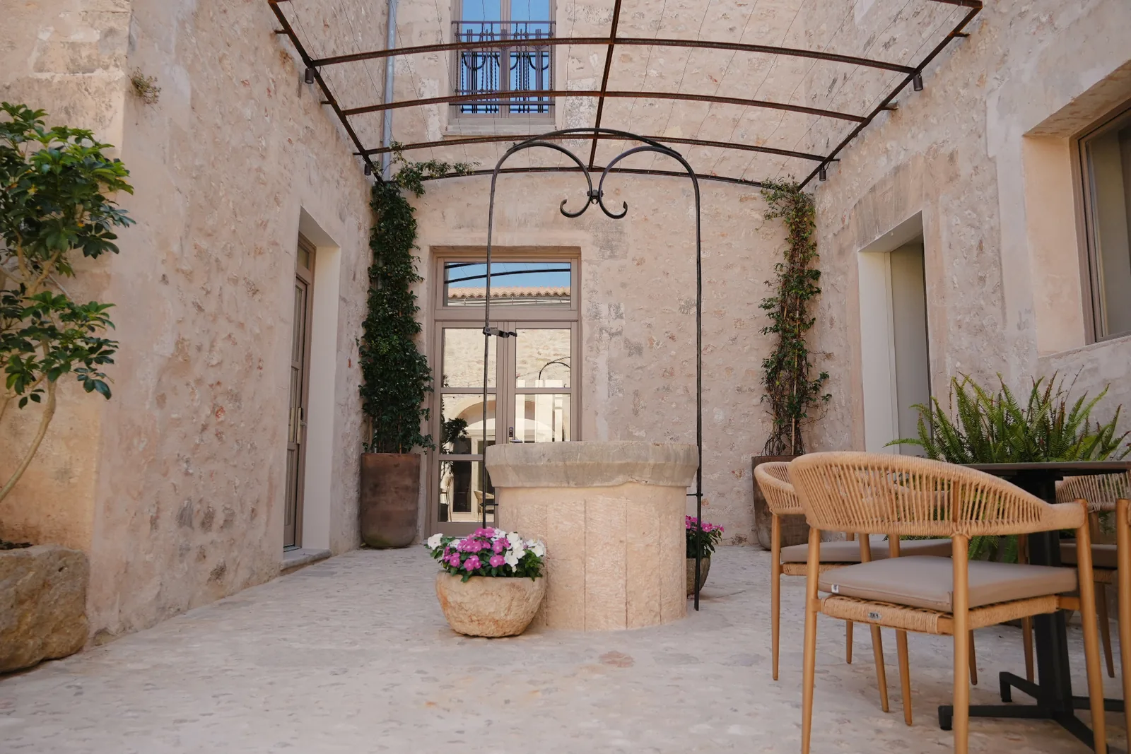 Courtyard at BYTRA Boutique Hotel by night