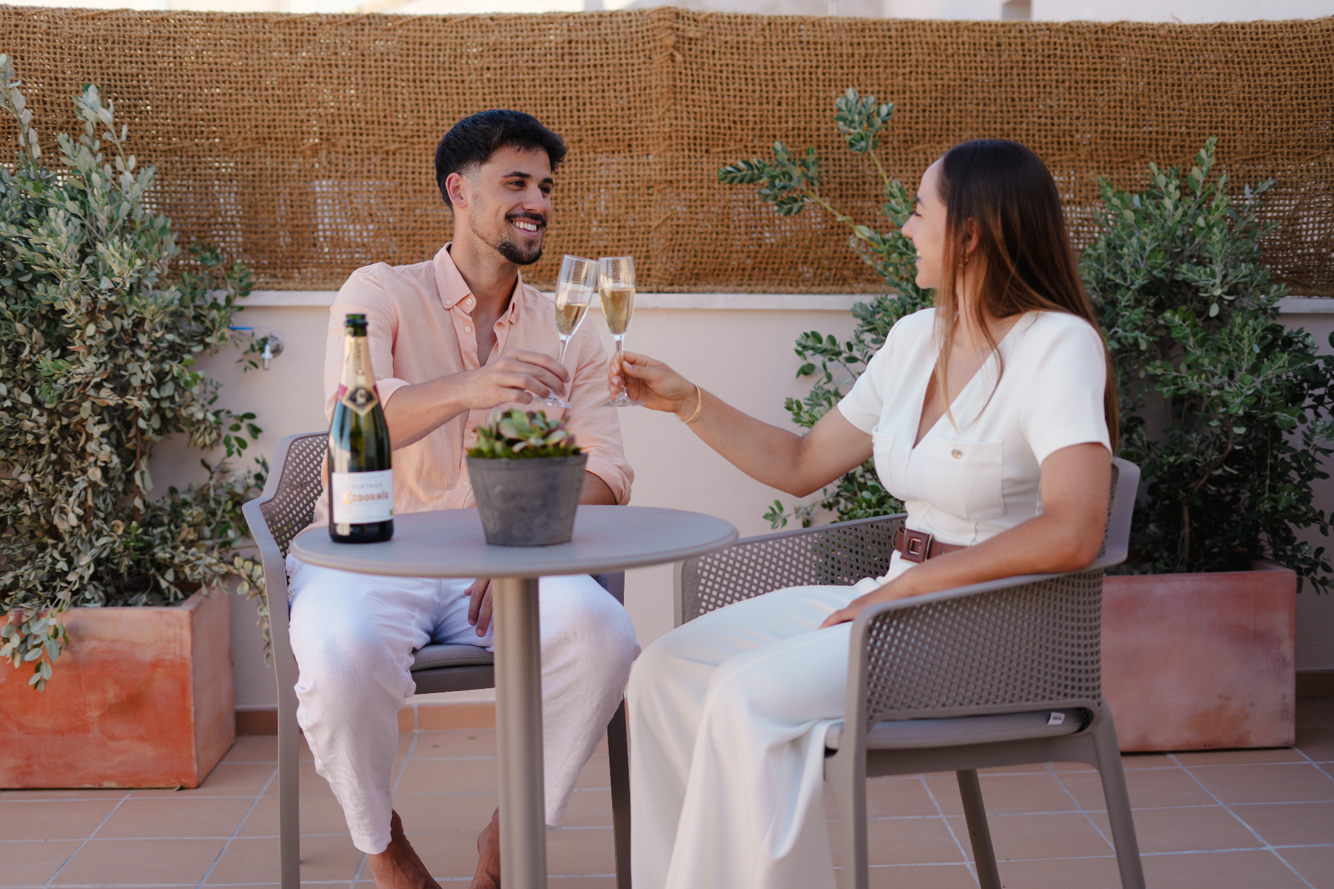Guests enjoying sparkling wine on the Superior Suite private terrace